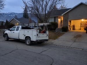 Work truck parked on a residential street in Salt Lake City Ut by Aegis Heating and Air