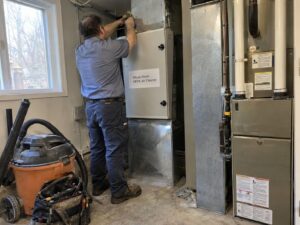 Installing a whole-home HEPA bypass air cleaner by Aegis Heating and Air
