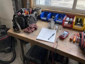Shop workbench during a morning tool check in Ac Capacitor Replacement by Aegis Heating and Air